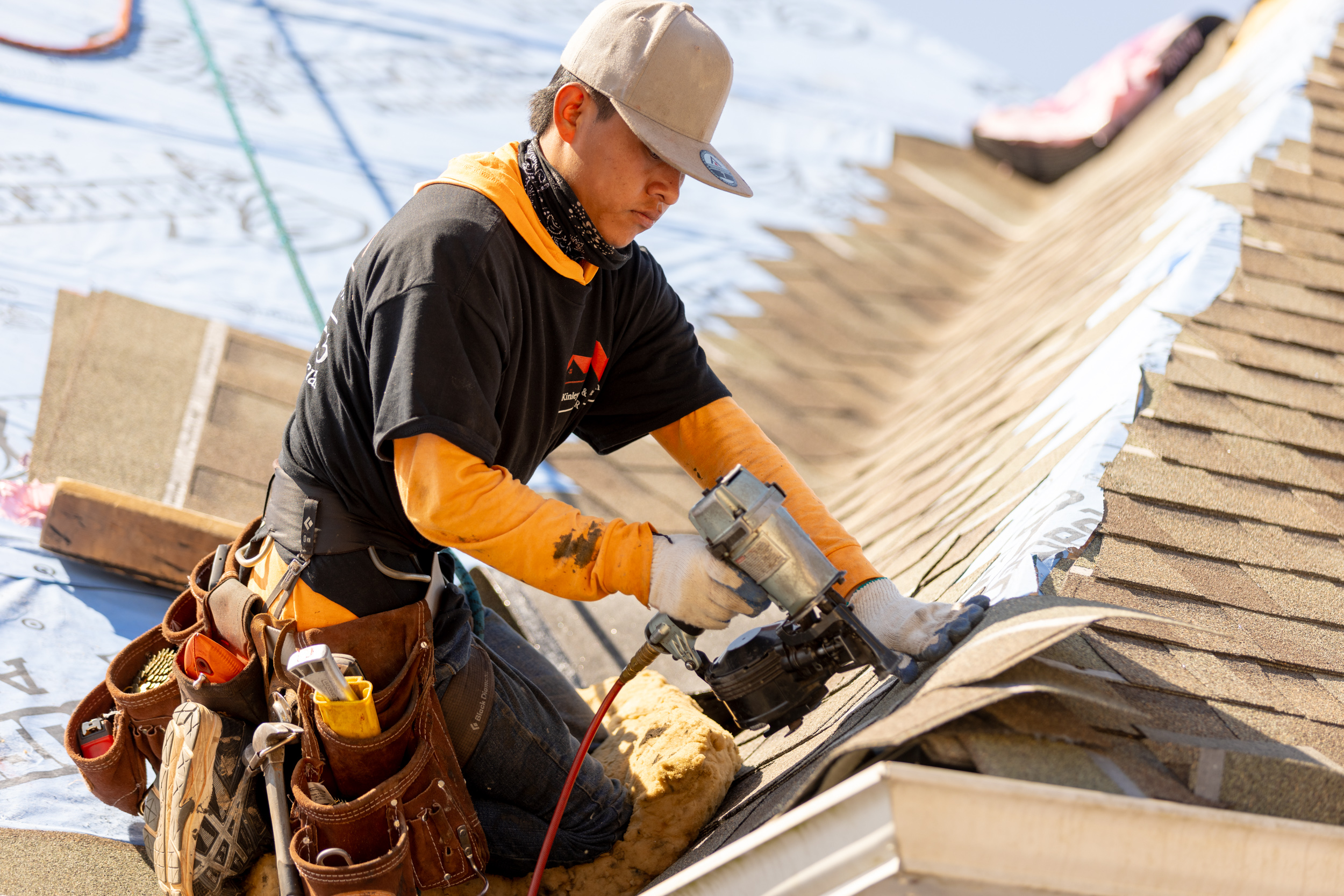 McKinley crew nailing shingles